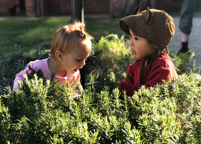 Young children playing in nature